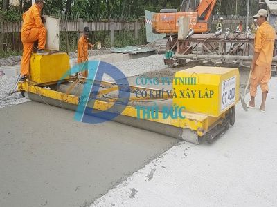 Máy trải bê tông xi măng 3 trục